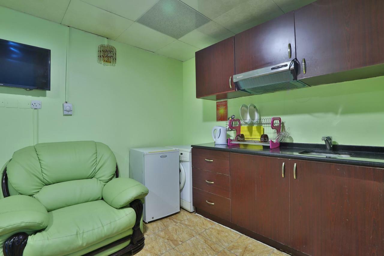 Oyo 261 Remas Hotel Apartment Дубай Экстерьер фото